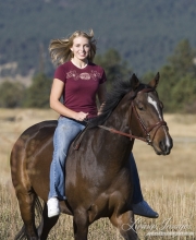 girl riding bay Appendix gelding in Boulder, CO