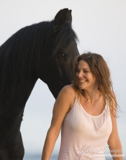 Summerland Beach, Ojai, CA, horse, purebred Friesian gelding and woman