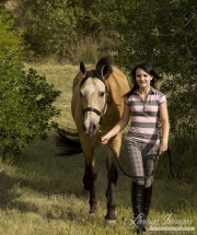 girl leading purebred buckskin Morgan mare in Castle Rock, CO