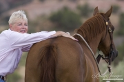 older woman with sorrel Quarter horse gelding in Grand Junction, CO