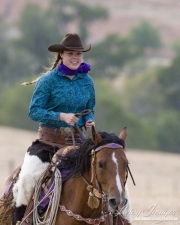 Flitner Ranch, Shell, WY - cowgirl and horse running