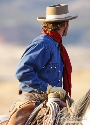 Flitner Ranch, Shell, WY - cowboy turning in saddle