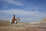 Flitner Ranch, Shell, WY - cowboy throwing a loop