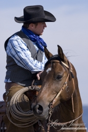 Flitner Ranch, Shell, WY - young cowboy on his horse