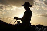 Flitner Ranch, Shell, WY - cowboy's sunset silhouette