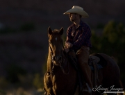 Cowboy sitting on Quarter Horse mare, San Cristobal Ranch, NM