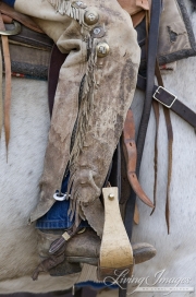 Sombrero Ranch, Craig, CO, cowboy's worn chaps and boot