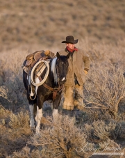 Sombrero Ranch, Craig, CO, cowboy next to horse