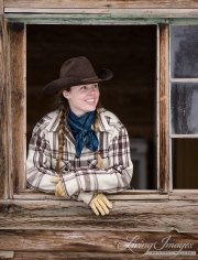 Flitner Ranch, Shell, WY, horses in winter, cowgirl looking out old cabin window