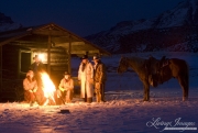 Flitner Ranch, Shell, WY, horses in winter, cowboys, cowgirls and horse at campfire at night