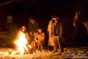 Flitner Ranch, Shell, WY, horses in winter, cowboys and cowgirl and horse at night at campfire