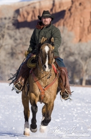 Flitner Ranch, Shell, WY, horses in winter, cowboy running horse in snow