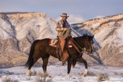 Flitner Ranch, Shell, WY, horses in winter, cowboy riding in snow