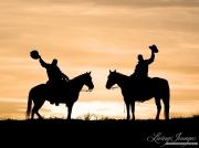 Flitner Ranch, Shell, WY, horses in winter, cowboys lift their hats at sunset